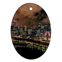 Cityscape Night Buildings Oval Ornament (two Sides) by Simbadda