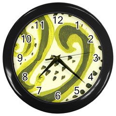 Yellow Swirls Wall Clock (black) by snowwhitegirl