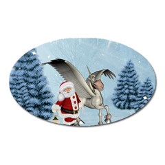 Santa Claus With Cute Pegasus In A Winter Landscape Oval Magnet by FantasyWorld7