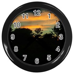 Pale Orange Sunset Wall Clock (black) by okhismakingart