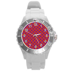 Purple Stars Pattern On Orange Round Plastic Sport Watch (l) by BrightVibesDesign