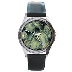 Closeup Photo Of Green Variegated Leaf Plants Round Metal Watch by Pakrebo