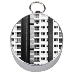 White And Black City Buildings Silver Compasses by Pakrebo