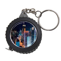 High Rise Buildings With Lights Measuring Tape