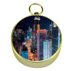 High Rise Buildings With Lights Gold Compasses