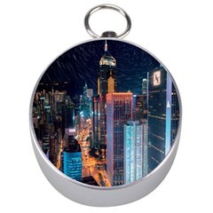 High Rise Buildings With Lights Silver Compasses