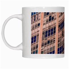 Low Angle Photography Of Beige And Blue Building White Mugs by Pakrebo