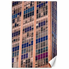 Low Angle Photography Of Beige And Blue Building Canvas 20  X 30  by Pakrebo