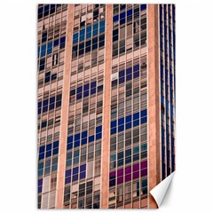 Low Angle Photography Of Beige And Blue Building Canvas 24  X 36  by Pakrebo