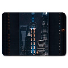 Lighted Tower Beside Building Large Doormat  by Simbadda