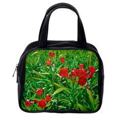 Red Flowers And Green Plants At Outdoor Garden Classic Handbag (one Side)