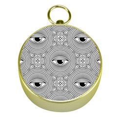 Eye Pattern Gold Compasses by designsbymallika