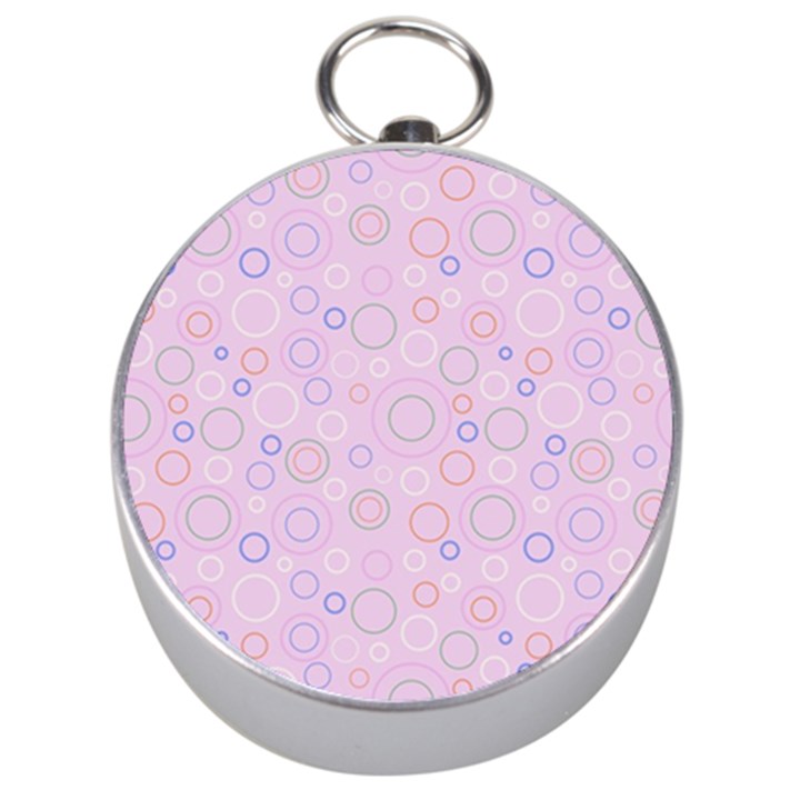 Multicolored Circles On A Pink Background Silver Compasses