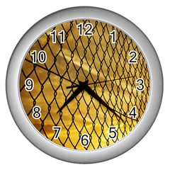 Chain Link Fence Sunset Wire Steel Fence Wall Clock (silver) by artworkshop