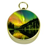 Scenic View Of Aurora Borealis Stretching Over A Lake At Night Gold Compasses Front