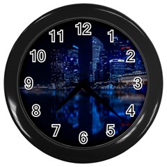 Illuminated Cityscape Against Blue Sky At Night Wall Clock (black) by Modalart