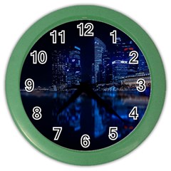 Illuminated Cityscape Against Blue Sky At Night Color Wall Clock by Modalart