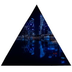 Illuminated Cityscape Against Blue Sky At Night Wooden Puzzle Triangle by Modalart