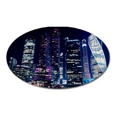 Black Building Lighted Under Clear Sky Oval Magnet by Modalart