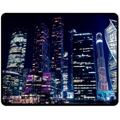 Black Building Lighted Under Clear Sky Fleece Blanket (medium) by Modalart