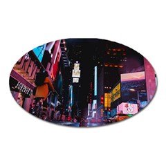 Roadway Surrounded Building During Nighttime Oval Magnet by Modalart