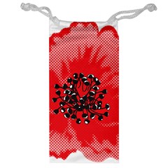 A Red Flower With A Black Center On A Black Background Jewelry Bag by catchydesignhill