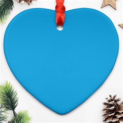 A Blue Background With A Black And White Cat On Top Of It Ornament (heart)