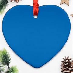 A Blue Background With A Black And White Clock Ornament (heart)