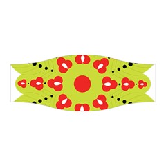 A Green And Red Flower With Black Dots Stretchable Headband