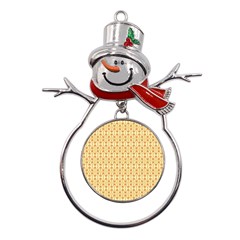 A Yellow And White Background With An Intricate Design Metal Snowman Ornament by catchydesignhill