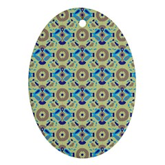 A Blue And Green Pattern On A Green Background Ornament (oval) by catchydesignhill