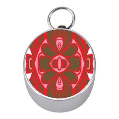 A Red And Brown Design On A White Background Mini Silver Compasses