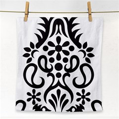 A Black And White Image Of An Ornate Design Face Towel