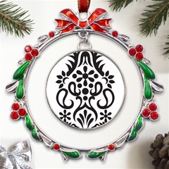 A Black And White Image Of An Ornate Design Metal X mas Wreath Ribbon Ornament