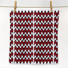 A Red And Black Zigzag Pattern On A White Background Face Towel