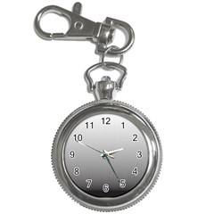 A Black And White Photo Of A Wall Key Chain Watches