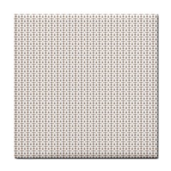 A White Background With A Brown Pattern On It Tile Coaster