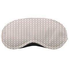 A White Background With A Brown Pattern On It Sleep Mask