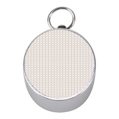 A White Background With A Brown Pattern On It Mini Silver Compasses