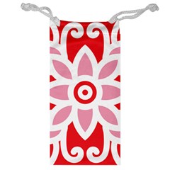 A Red And White Pattern With A Flower On It Jewelry Bag