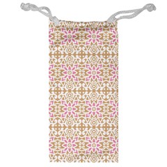 A Pink And White Flower Pattern On A Brown Background Jewelry Bag