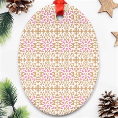 A Pink And White Flower Pattern On A Brown Background Oval Ornament (two Sides)