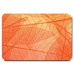 Abstract Texture Of Colorful Bright Pattern Of Transparent Leaves Of Orange And Yellow Color Large Doormat by Posterlux