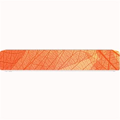 Abstract Texture Of Colorful Bright Pattern Of Transparent Leaves Of Orange And Yellow Color Small Bar Mat